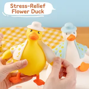Stressabbau Entenspielzeug zum Drücken mit abnehmbarer Kleidung, langsamer Rücksprung
