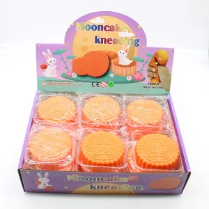 12 pieces of orange mooncake kneading toys presented in a colorful festive display box