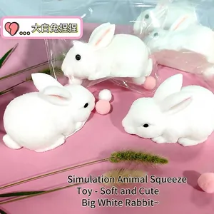 Close-up detail of soft white rabbit squeeze toys on pink background for sensory stress relief