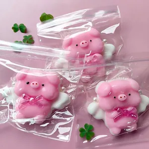 Simpatico maialino rosa giocattolo antistress con ali e fiocco