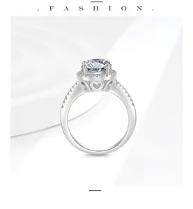 Detailed side view of a S925 sterling silver moissanite ring with heart engraving.