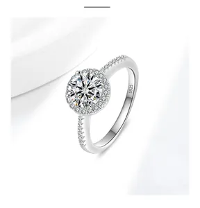 Close-up of S925 sterling silver halo moissanite ring with micro-pave diamonds.