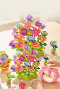 Detailed macro view of children's DIY flower press machine and colorful garden building set