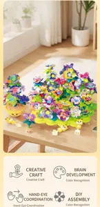 Detail view of DIY flower garden building toy showing colorful petals and accessories