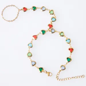 Detailed view of gold-plated titanium steel chain with colorful heart glass inserts.