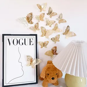 Detailed view of 3D metallic gold butterfly wall stickers in a cozy home decor setting