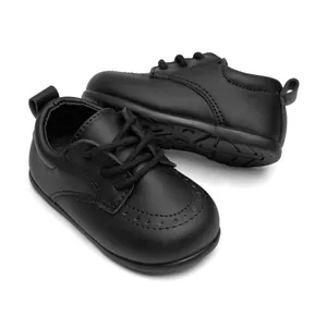 Klassische schwarze Baby-Lauflernschuhe aus Leder mit weicher, rutschfester Sohle
