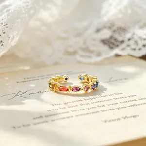 Elegant S925 silver gold-plated ring featuring multi-colored marquise and baguette zircons