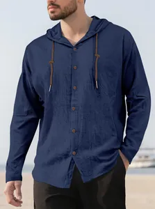 Detail of the hooded neckline and brown drawstrings on a navy blue cotton casual shirt.