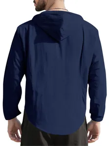 Back view detail of a navy blue long-sleeve hooded cotton shirt for men in a loose fit