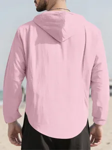 Detailed back view of a men's loose pink hooded cotton shirt for casual beach wear