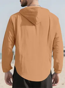 Detail shot of the back of a camel men's linen hooded shirt featuring a curved hem design