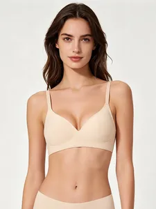 Detailed view of a seamless nude bra with soft support and U-shaped neckline for women