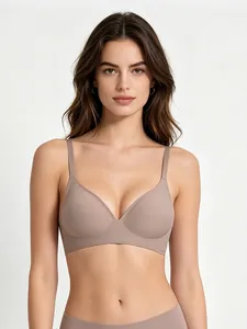 Close-up of seamless jelly bra with soft support and thin straps on a female model
