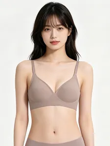 Detailed shot of a seamless taupe bra showing the smooth finish and soft support