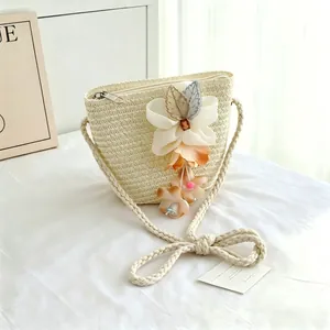 Adorable cream straw woven crossbody bag with 3D floral decoration for girls and ladies
