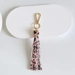 Pink leopard print leather tassel keychain with gold lobster clasp bag charm