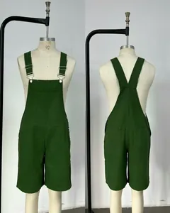 Front and back views of men's dark green denim overall shorts on mannequin