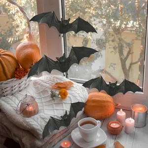 Realistic 3D black bat wall stickers applied on window for cozy Halloween home decor