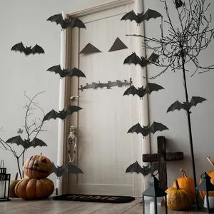 Macro view of 3D bat wall stickers showing layered wings for realistic Halloween decor