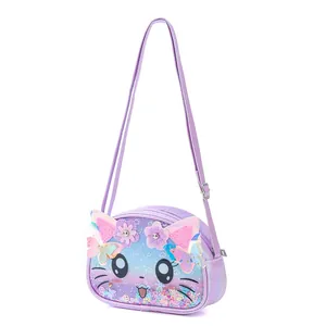 Close-up view of cute purple cat cross-body bag with glitter and sequins detail.