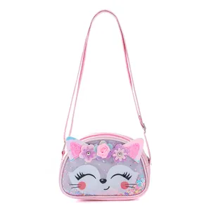 Detailed front view of a cute pink cartoon animal crossbody bag for kids with glitter