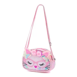 Cute pink cat-shaped crossbody bag for children with glitter and flower details