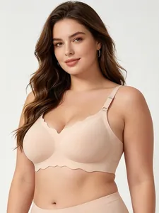 Detailed view of nude plus size seamless bra featuring scalloped edges and adjustable straps