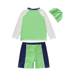 Boy's 3-piece quick-dry swimwear set with long-sleeved top, shorts, and swim cap