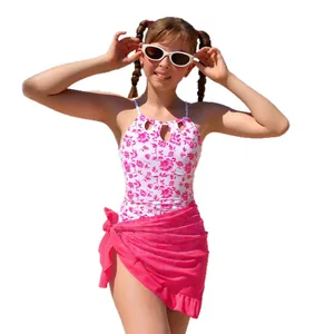 Floral girls' one-piece swimsuit with matching pink mesh wrap skirt