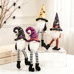 Macro view of four Halloween long-legged gnomes sitting on a clear tiered display stand