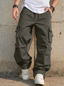 Macro detail of men's loose fit parachute cargo pants showing olive technical fabric