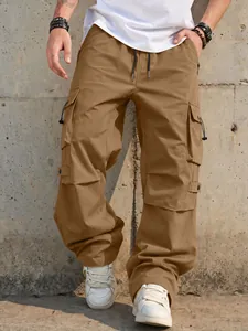 Close-up detail of brown men's functional parachute cargo pants with drawstring waist