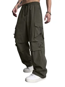 Detailed view of men's army green wide-leg cargo pants with functional pockets