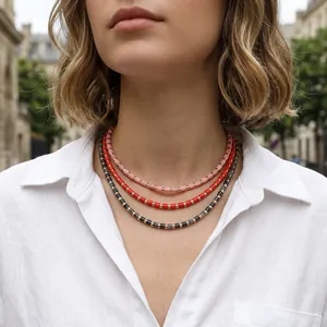 Handmade semi-precious stone beaded necklace with gold spacers for layered styling.