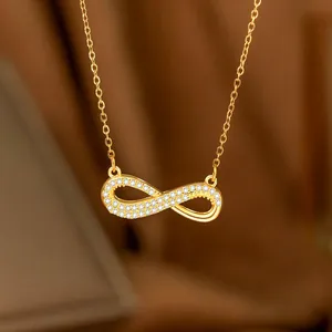 Gold-plated infinity necklace with micro-pave white zircons on a delicate steel chain