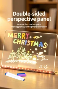 Detailed view of a glowing LED note board featuring Christmas graffiti and markers