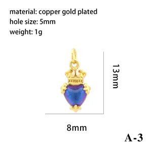 Detail view of heart crystal pendant with 18k gold crown showing dimensions and materials