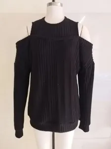 Front view of a stylish black cold shoulder ribbed knit long sleeve top on a white mannequin.