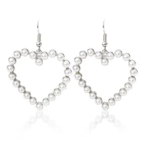 Elegant hollow heart-shaped pearl drop earrings with silver metal hooks for women