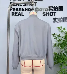 Rear view of grey autumn pilot jacket with ribbed hem and cuffs