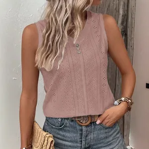 Casual sleeveless pink tank top featuring button detail and delicate eyelet pattern