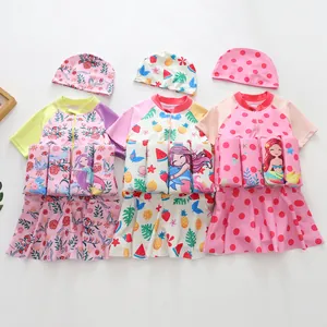 Girls buoyancy one-piece swimsuits with matching caps, featuring cute mermaid patterns
