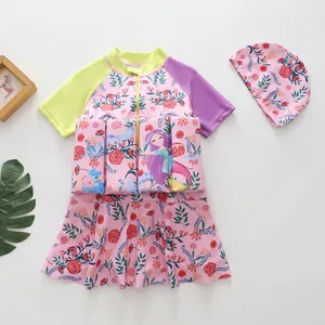 Pink girl's buoyancy swimsuit with floral mermaid print and matching swimming cap