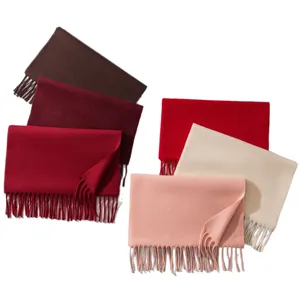 Soft wool scarves with tassel trim in a variety of solid colors for autumn and winter