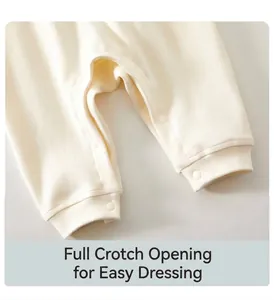 Detailed view of baby cotton romper featuring convenient snap buttons at the crotch