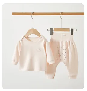Close-up of a pink infant thermal set with a cute rabbit illustration on the pants
