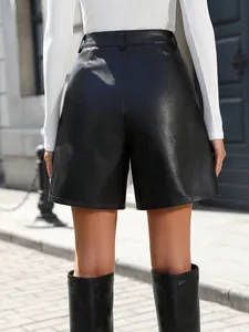 Detailed back view of women's black high-waisted A-line PU leather wide-leg shorts.