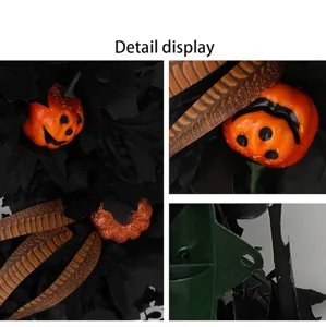 Detailopname van Halloween-krans met zwarte esdoornbladeren en oranje pompoenen