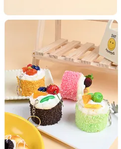Realistic colorful simulation mousse cake pendants featuring assorted fruit toppings